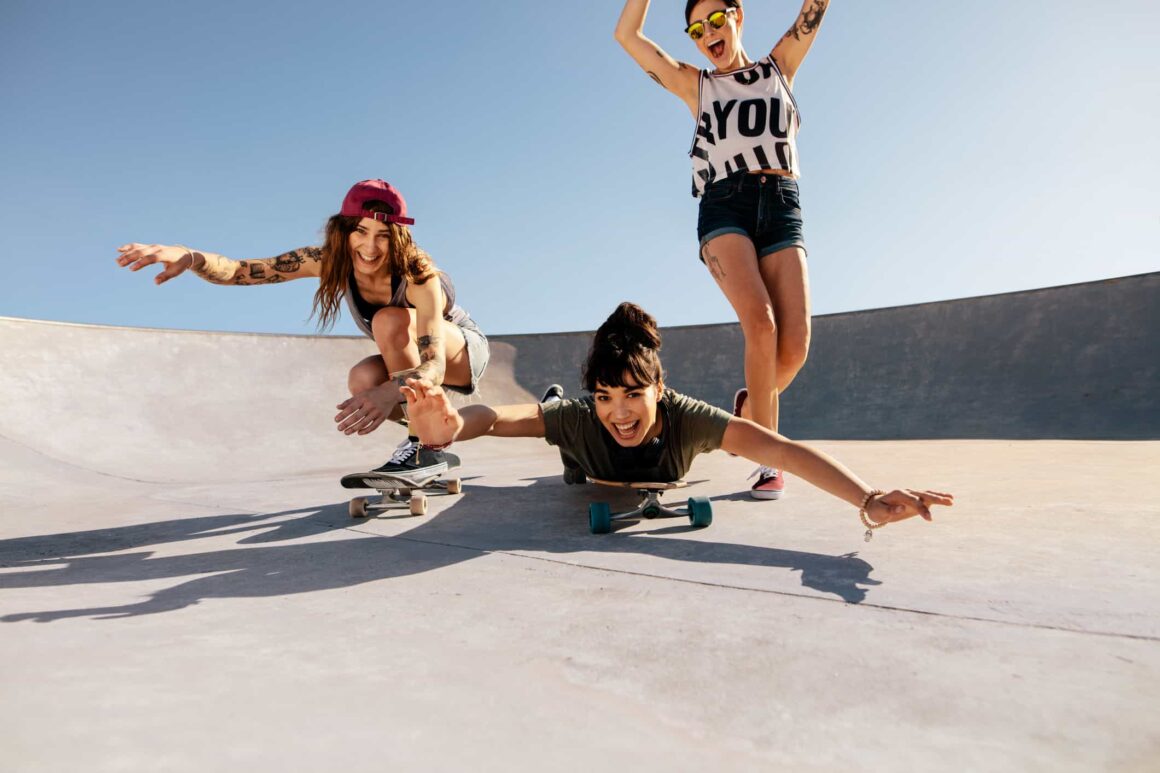 Teen girlfriend reverse riding skater
