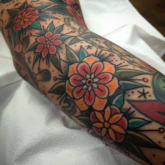 7 Time Honoured Traditional Sleeves  Tattoodo  Traditional tattoo sleeve Tattoo  sleeve filler Traditional tattoo sleeve filler