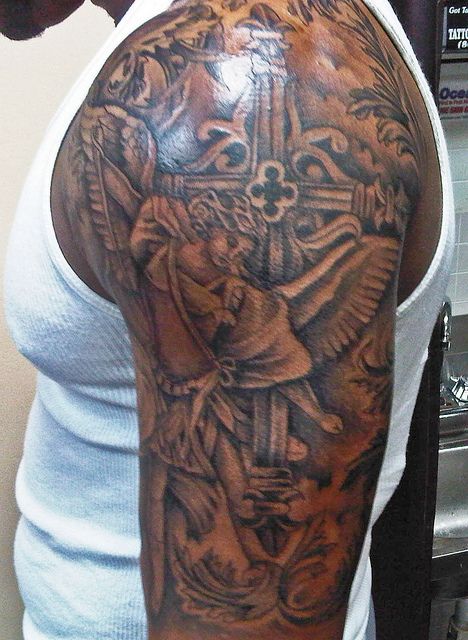 religious half sleeve tattoos forearm