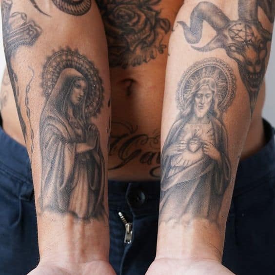 Fine line Virgin Mary tattoo on the back of the neck