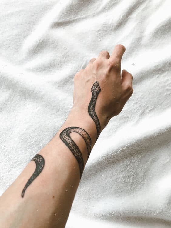 Snake tattoo 35 incredible tattoos for men and women 